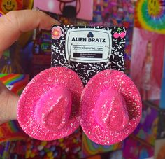 Just a heads up! The glitter may transfer to face, hair, clothing, etc -Hypoallergenic stainless steel hooks. Comes with a rubber backing -2.5 x 2 x 0.8 inches Cowboy Hat Earrings, Pink Cowboy Hat, Bead Charms Diy, Funky Earrings, Glitter Earrings, Halloween Earrings, Themed Jewelry, Trendy Earrings, Heads Up