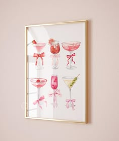 a framed painting on the wall with various cocktails in glasses and pink bow ties