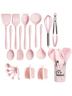 the kitchen utensils are all pink and ready to be used in cooking or baking