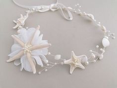 Starfish Hair Vine, Beach Wedding, shell Hair Accessories, Mermaid Headpiece, beach Tiara, Bridal Hair Vine, Seashell Headband, shell crown, boho A magnificent beach wedding accessory for the bride, flower girl, and bridesmaid. size: approx.  18'' (45cm.) I am open to custom orders. To see more wedding accessories, please click here: https://www.etsy.com/shop/NLcreation?ref=hdr_shop_menu Shipping & Policies **Please, read and examine the item you are thinking about purchasing carefully. Please r White Adjustable Hair Accessories For Beach, Adjustable White Hair Accessories For Beach, Adjustable White Hair Accessories For The Beach, White Shell For Wedding, Shell Hair Accessories, Mermaid Headdress, Starfish Headpiece, Seashell Tiara, Seashell Headband