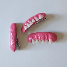 Handmade funky teeth hairclips! These creepy hairclips are all hand sculpted out of polymer clay with premade acrylic teeth embedded in them for that gummy smile look.  These hairclips have a line of bottom incisors. I make all of these by hand so each pair is unique just like our own smiles! Note: This listing is for 1 hairclip, not a set Teeth Craft, Clay Barrettes, Cute Hair Pins, Polymer Clay Hair Clips, Clay Hair Clips, Weird Hair, Gummy Smile, Birthday List, Crazy Hair