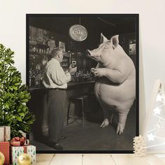 an old black and white photo of a pig standing in front of a man at a bar