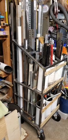 a metal cart filled with lots of different types of tools