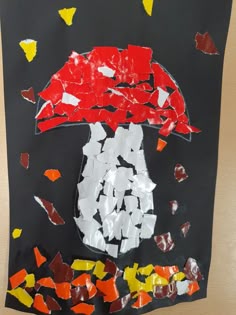 a child's artwork made out of torn paper