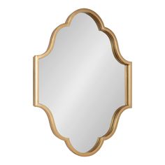 a gold framed mirror with an ornate design on the front and back side, against a white background