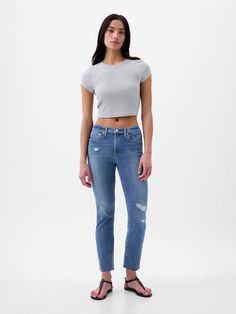 Fit: A slim, ankle-length classic.  More room than our True Skinny, but just as comfortable.  Fabric: 87% Cotton, 7% Recycled Materials, 5% Polyester.  Stretch: Stretch Jeans.  A bit of hug & a lot of hold.  Comfortable & designed to flatter.  Rise: Mid Rise Jeans.  Look: A classic five-pocket jean in medium indigo wash with fading and distressed detailing.  Details: Zip fly, five-pocket styling & holds-you-in front pockets.  Responsibly Made: This pair of jeans is part of our water-saving Washw Jeans Look, Ankle Length Jeans, Water Saving, Mid Rise Jeans, Pocket Jeans, Slim Jeans, Slim Legs, Petite Size, Stretch Jeans