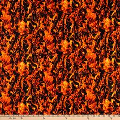 an orange and black background with lots of fire on the bottom half of it, as well as some smaller flames in the middle