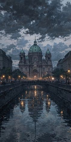 a large building sitting on the side of a river