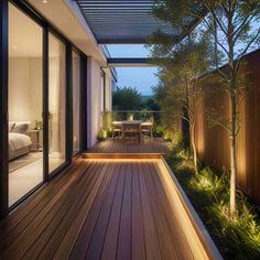 an outdoor deck area with lights and plants on it, surrounded by wooden planks