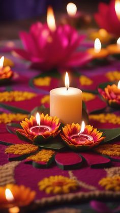 candles are lit on a colorful table cloth