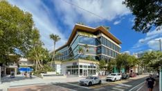 an artist's rendering of a building on the corner of a street