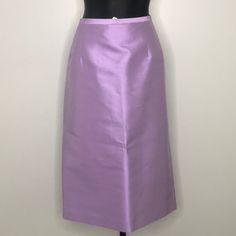 Michael Kors Iridescent Purple Wool/Silk Pencil Skirt Beautiful Condition. New With Tags. Made In Italy. Crafted In 50% Wool / 50% Silk Size 14* ~ 16.25" Waist X 21" Hips X 28.75" Length Formal Satin Pencil Skirt, Pink Silk Evening Skirt, Formal Knee-length Satin Skirt, Formal Satin Knee-length Skirt, Formal Pink Satin Bottoms, Formal Fitted Satin Pencil Skirt, Spring Formal Satin Skirt, Fitted Satin Pencil Skirt For Formal Occasions, Evening Silk Midi Skirt