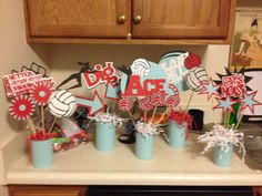 a bunch of cupcake toppers on a kitchen counter