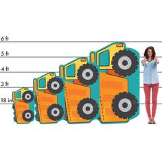 a woman standing in front of a drawing of a truck with wheels on it's sides