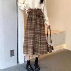 Olivia Mark - Brown Checkered Pleated Midi Skirt with High Waist and Large Hem Umbrella Style Checkered Skirt Outfit, Brown Skirt Outfit, Brown Plaid Skirt, Long Brown Skirt, Warm Skirts, Plaid Skirt Outfit, Plaid Midi Skirt, Midi Skirt Casual, Brown Checkered