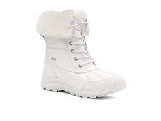 a women's white winter boot with fur linings and laces on the side