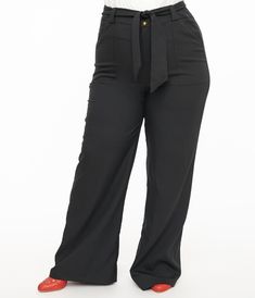 These chic 1950s style plus size wide leg trousers are crafted in a black woven blend and features a thick waistband that is secured by a front zipper and button closure. Complete with a black self-tie sash, functional side pockets, and faux back pockets!.Available in sizes XS-5X while supplies last. | Unique Vintage Plus Size 1950S Black Wide Leg Trousers | Size 1X/16 Vintage Black Short Length Bottoms, Vintage Plus Size Black Dress, Plus Size 1940’s, Black Wide-leg Dress Pants With Button Closure, Black Wide-leg Pants With Button Closure, Black Wide Leg Trousers, 1950s Fashion, Front Zipper, Wide Leg Trousers