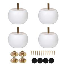 three white apple shaped lamps with screws and studs on each side, all in different sizes