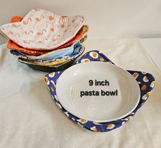 three bowls are stacked on top of each other with the words 9 inch pasta bowl