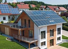 a house with solar panels on the roof