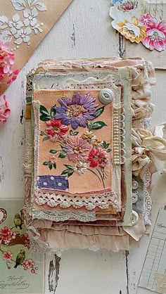 an altered picture with flowers and lace on it