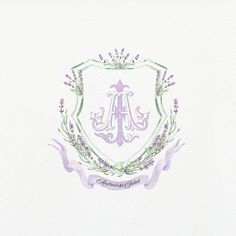 a watercolor drawing of a shield with lavenders and an initial in the center