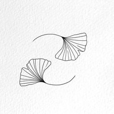 two seashells in the shape of a circle on white paper with black ink