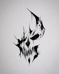 a black and white drawing of a demon's head