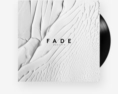 a black and white photo with the word fade on it, in front of an abstract background