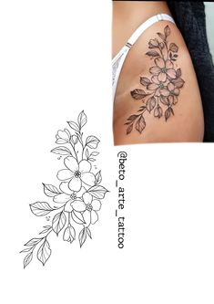 a woman's thigh with flowers and leaves on it