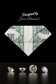 an origami dollar bill with diamonds on it and the words, designed by james diamond