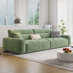 a living room scene with focus on the couch and coffee table in the center area