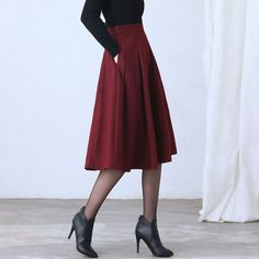 "★★ FEATURES * Wool skirt * Polyester lining * Two side seam pockets * Right zipper closure * pleated detail * Plus size full skirt * A Line Skirt * Perfect for Winter, autumn, spring * Dry clean ★★ The model is 170 cm (5′ 7″) tall with a 80 cm (31.5\") bust, 66 cm (26\") waist. She is wearing the red wool skirt in size XS. ★★ Bespoke Order Service If you Request other color Request the length Your height is not between 155 cm- 172 cm Your weight is over 75 kg I can do it for you, It will need s Winter Wool Skirt, Midi Wool Skirt, Pleated Circle Skirt, Skirt Winter, Skirt A Line, Red Midi, Skirt High Waist, Navy Skirt, Wool Skirt