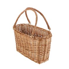 a wicker basket with handles on a white background