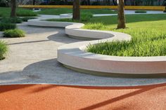 an outdoor area with concrete steps and grass