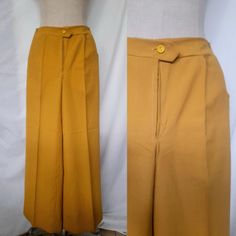 Vintage 70's costume made, linen blend mustard yellow groovy pants in pastel pink. Hight waist, wide leg with crease and bell-bottoms. Inseam pockets.  Front closure with top button and zipper. No tag size but they fit a XS/S. Please check measurements for accuracy.  As reference, the manequin is a size EU36/UK8 but the pants are only pined to the manequin.  Measurements  Waist 67cm/24.8" Hips 90cm/35.5" Length: 99cm/39" In very good vintage condition. For more information please feel free to co Yellow Retro Pants Affordable, Yellow Wide Leg Pants, 70's Costume, Groovy Pants, 70s Costume, Womens Trousers, Rose Pastel, Pantalon Large, Mustard Yellow