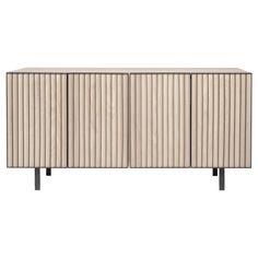 the sideboard is made from wood and has three doors, one with vertical stripes on it