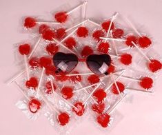 a bunch of lollipops with sunglasses on them