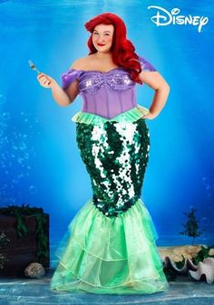 the little mermaid is dressed up in her green and purple outfit, holding a knife