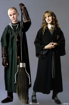 two children dressed in harry potter costumes