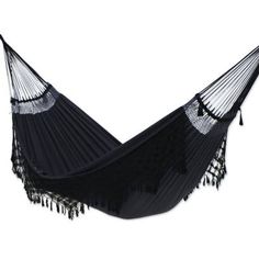 a black hammock with fringes hanging from it's side on a white background