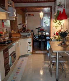 the kitchen is clean and ready to be used as a dining room or living room