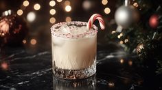 a christmas drink with candy cane on the rim