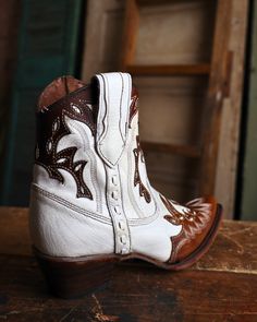 Whether you're looking for a statement piece to make heads turn or a versatile option for everyday wear, Circle G by Corral​ boots offer an unparalleled range of options to cater to your taste. 7.5" Height Leather ​Pearl White Cognac Overlays Snip Toe Leather Lining ​Leather Outsole Single Stitch Welt Western Heel Pull On Pull Straps​ Embroidery Boots, Corral Boots, Pearl Leather, Western Boots, Pearl White, Cognac, Cowboy Boots, Statement Pieces, Camel