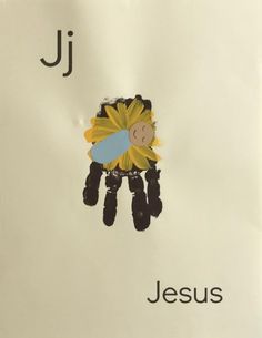 a child's handprint with the word jesus on it