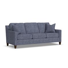 an image of a couch with pillows on the top and bottom half, in grey fabric