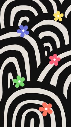 an abstract black and white pattern with colorful flowers