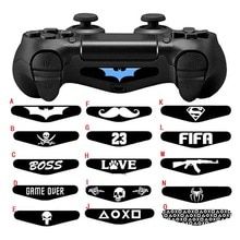 the batman video game controller stickers are shown in various shapes and sizes, including two controllers