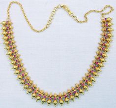 "Vintage 22 karat solid gold spiky design necklace(champakalee har) from rajasthan india. made of solid 22 karat gold and sated ruby color stones. full handcrafted great piece for your jewelry collection. buyer will get gold test report for this item for free. total weight of necklace-38 grams( 1.33 ounce), total lenght of necklace-18\"(we can adjust length),width of necklace-0.8\",material -solid 22 karat gold." 22k Gold Necklaces For Festivals And Celebrations, 22k Gold Necklaces For Celebration And Festivals, Temple Jewelry Ruby Necklaces For Festivals, 22k Gold Temple Necklace For Formal Festivals, Festival Temple Necklace With 17 Jewels, Red 22k Gold Temple Jewelry Necklace, Ruby Temple Jewelry Necklaces For Festivals, Red 22k Gold Necklace For Celebration, Festive Gold Temple Necklace With Ruby