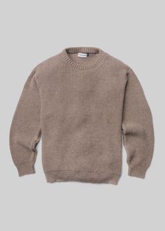 This is not a blend. An alpaca's coat provides superior performance in dense climates, for every season. The Alpaca Sweater is ultimately resistant to humidity and chill – a quality that can't be replicated with other yarns.Superfine alpaca wool is at least 50% softer than traditional wool due to its smoother individual strands. Knit together by a familiar shaker stitch, this sweater is an excellent insulator with each rib blending into a plush hand.Please be aware of a .5" tolerance for slight Knitted Sweaters Men, Alpaca Coat, Wool Knit Sweater, Mens Sweaters, Wool Sweater Men, Alpaca Sweater, Alpaca Yarn, Men In Uniform, Sweaters And Jeans